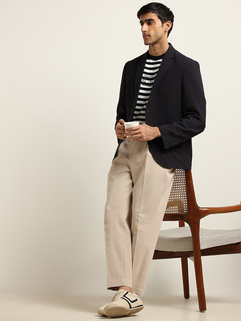 Stylish Men's Outfit with Pink Chinos and Navy Blue Blazer